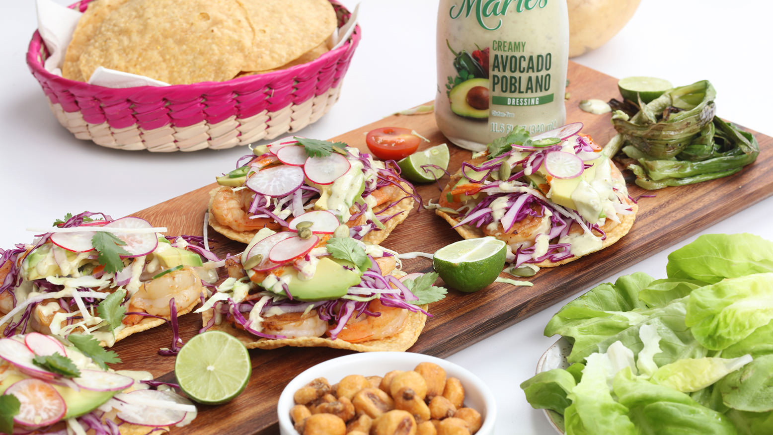 Shrimp Tostadas are made with Marie’s Creamy Avocado Poblano dressing.
