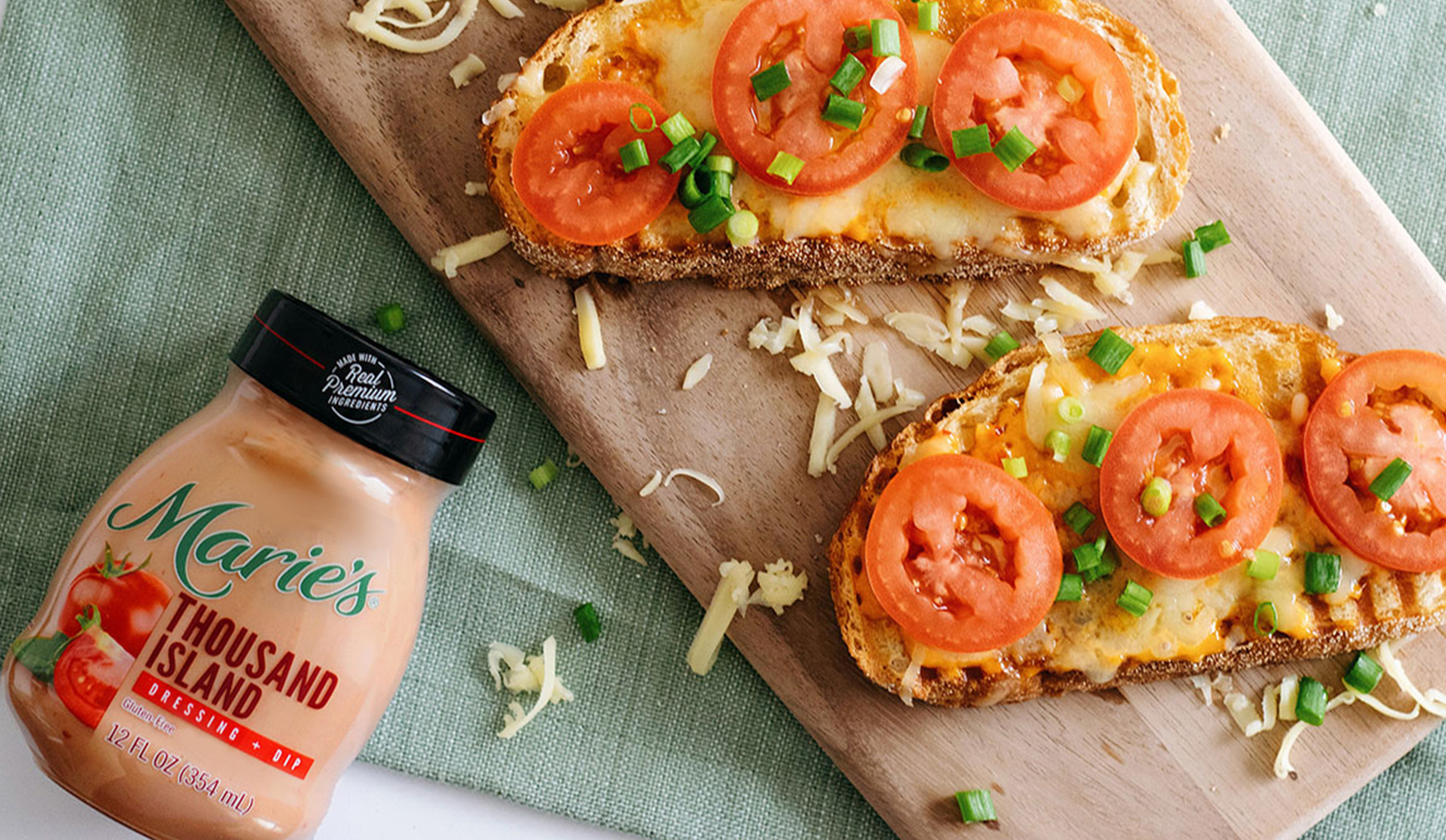 Melty Cheese and Tomato Sandwiches is made with Marie’s Thousand Island dressing.