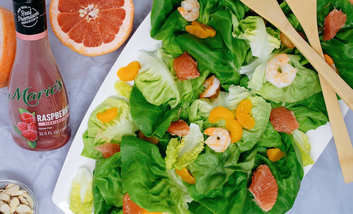 Tangy Citrus Salad is made with Marie’s Raspberry Vinaigrette.