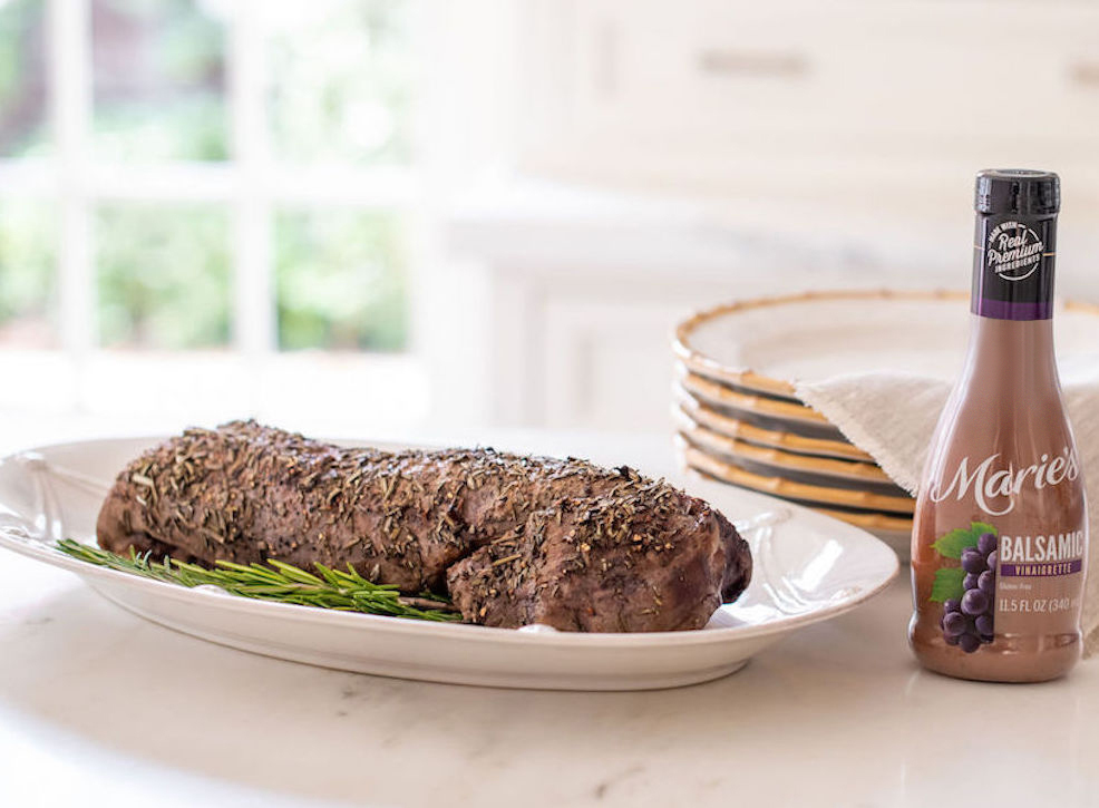 Rosemary Crusted Balsamic Beef Tenderloin is made with Marie's Balsamic Vinaigrette.
