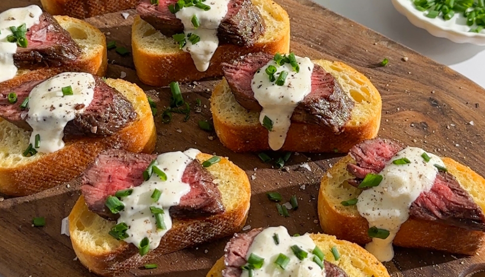 Slices of baguette topped with Steak and Blue Cheese